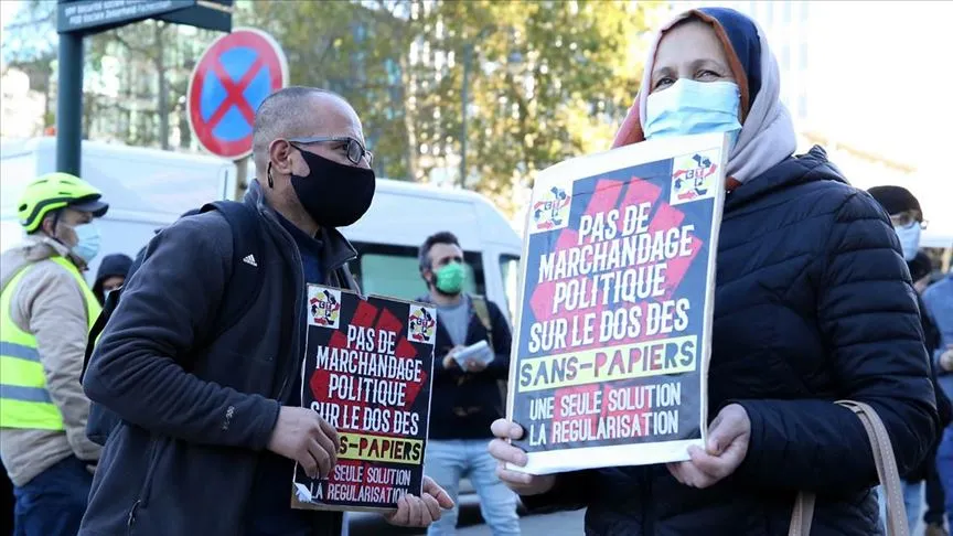 Belçika Kağıtsızlar Koordinasyonu'nun çağrısıyla mülteci ve göç işlerinden de sorumlu